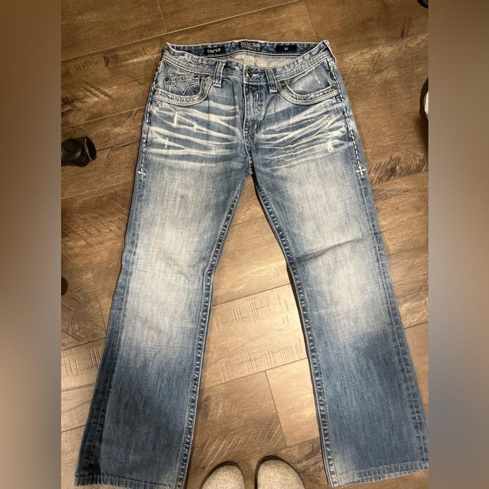 Men’s Affliction brand jeans from buckle